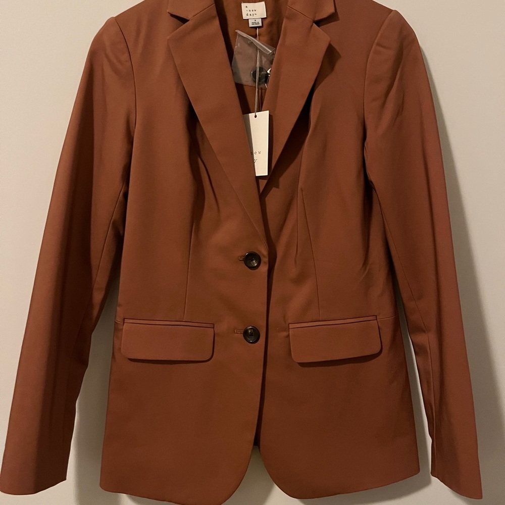 Never worn pea coat, beautiful mauve color, nice material.